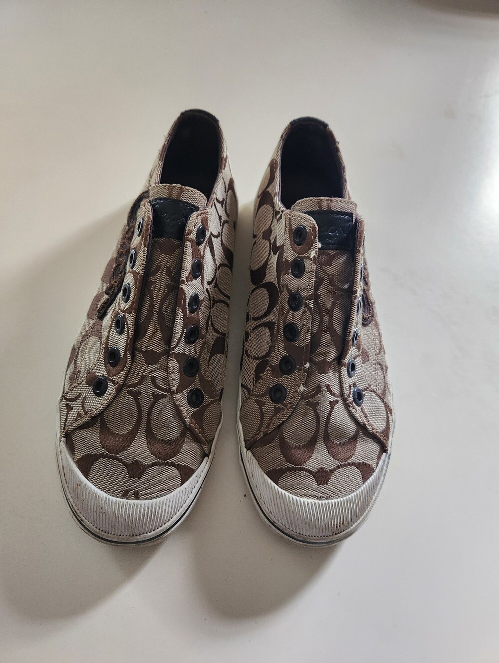 Womens' Coach Kids Signature Canvas Slip-On Sneakers in Brown